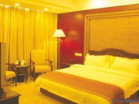 Tian Cheng Grand Hotel Rizhao Rum bild
