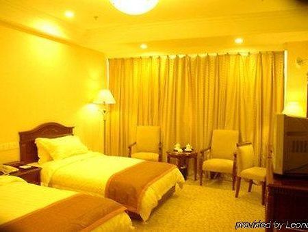 Tian Cheng Grand Hotel Rizhao Rum bild